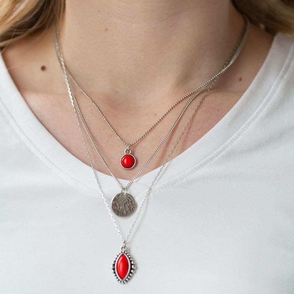 Silver color 3 tiered necklace with red bead accents